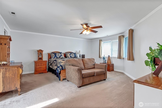 bedroom featuring baseboards, light colored carpet, and crown molding