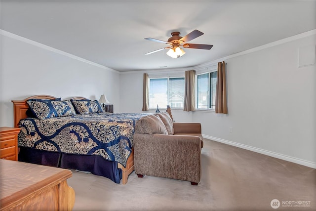 bedroom with baseboards, crown molding, carpet, and a ceiling fan