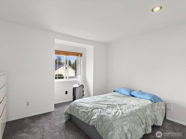 carpeted bedroom featuring recessed lighting and baseboards