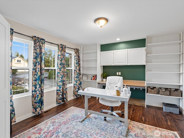 office area featuring dark wood-style floors and baseboards