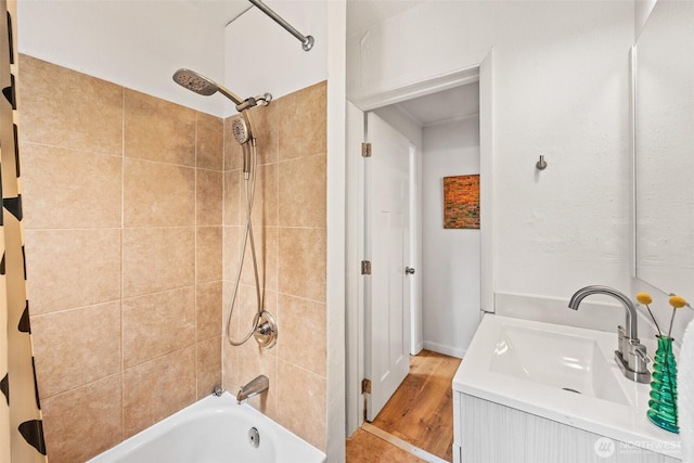 bathroom with shower / washtub combination and vanity