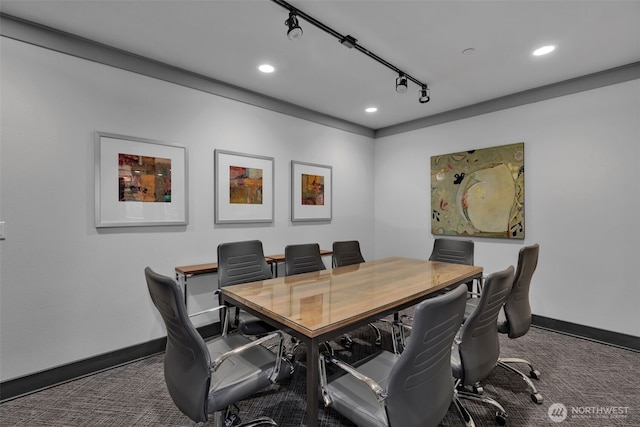 office area with rail lighting, baseboards, and carpet