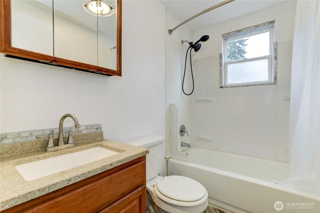 full bathroom with shower / tub combo with curtain, toilet, and vanity