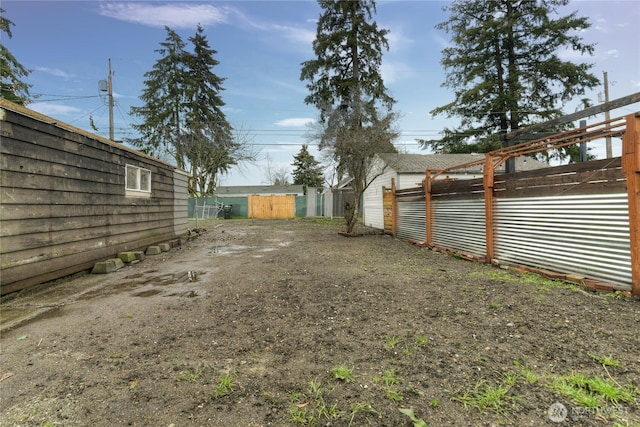 view of yard featuring fence