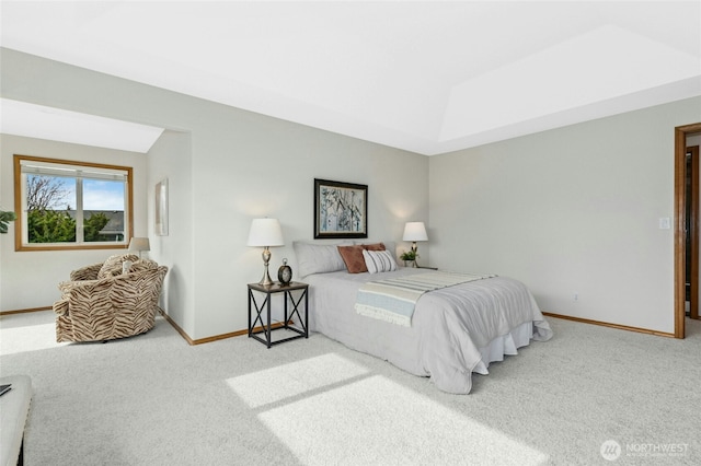 bedroom with carpet flooring and baseboards