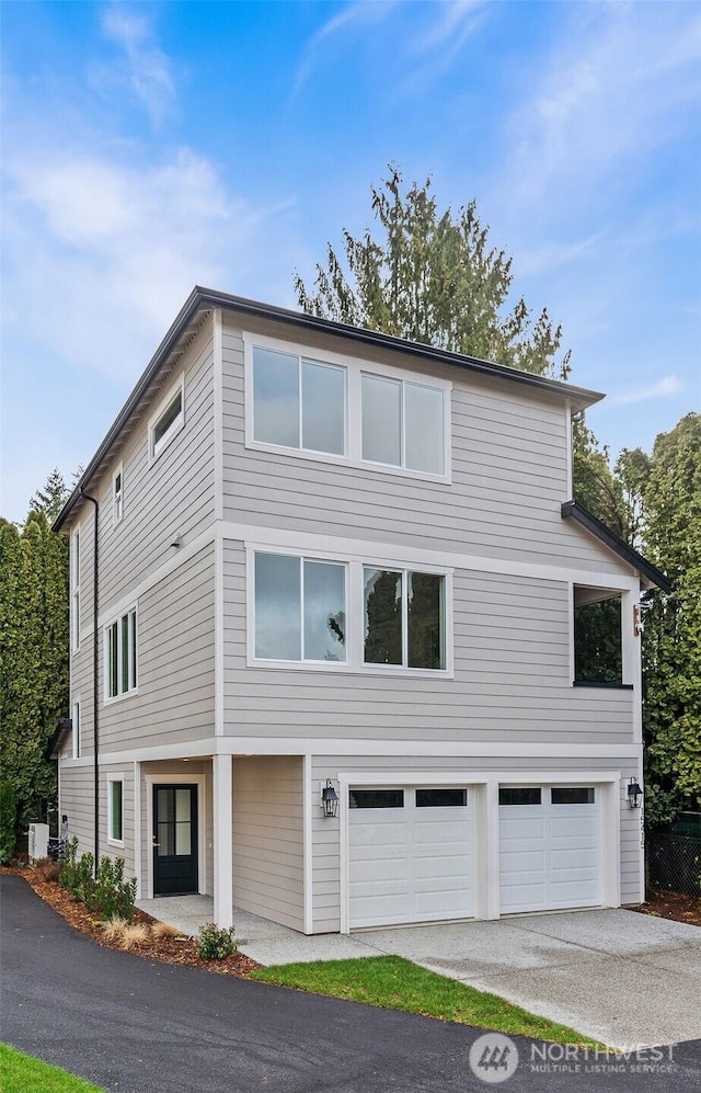 view of front facade with an attached garage