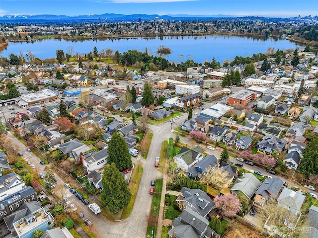 aerial view with a residential view and a water view