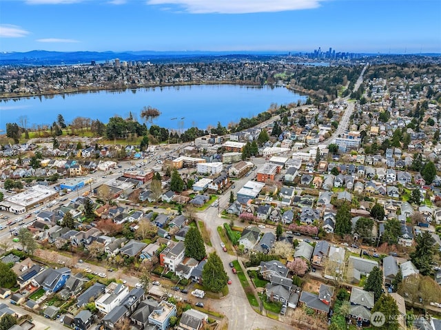 aerial view featuring a water view and a residential view