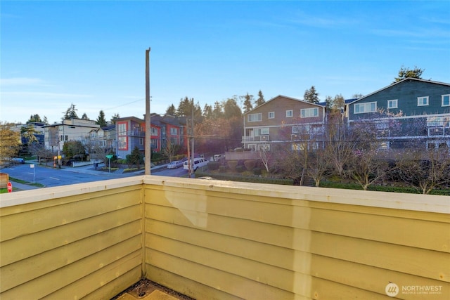 balcony featuring a residential view