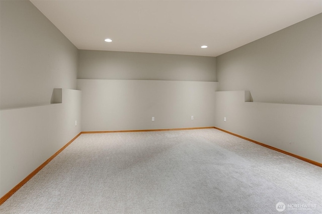 carpeted empty room with recessed lighting and baseboards