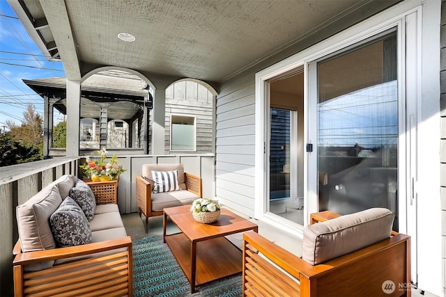 balcony with an outdoor hangout area