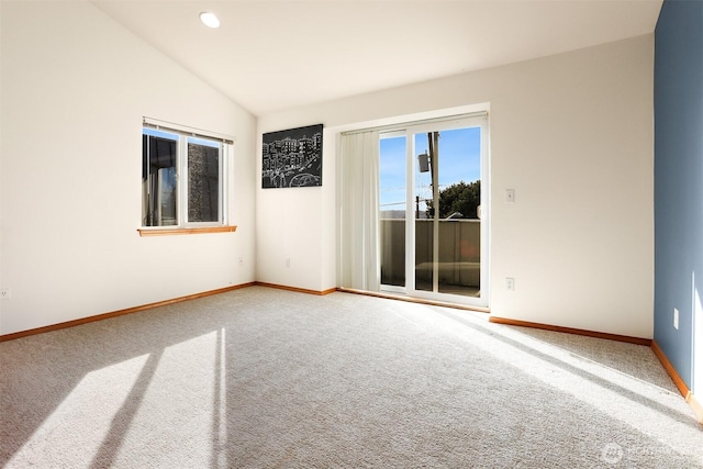 unfurnished room with recessed lighting, baseboards, lofted ceiling, and carpet floors