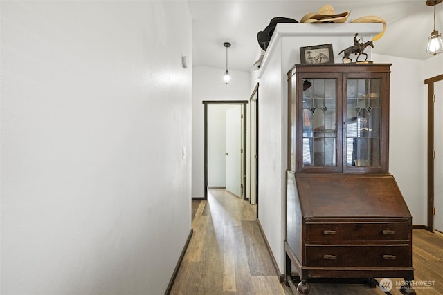 154 Dreamscape Rd, Walla Walla, WA 99362 - hallway with baseboards and wood finished floors