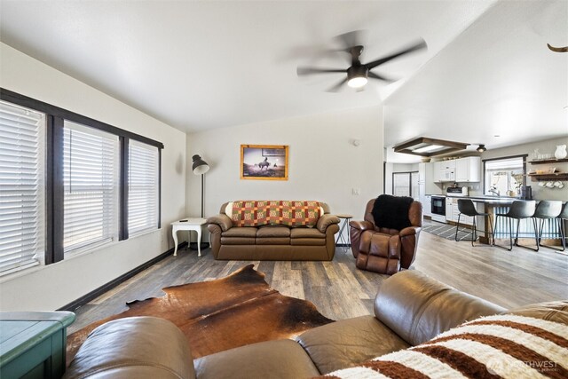 154 Dreamscape Rd, Walla Walla, WA 99362 - living area featuring ceiling fan, baseboards, lofted ceiling, and wood finished floors