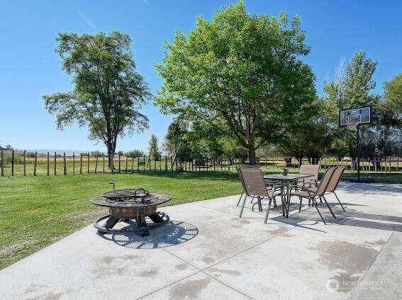 154 Dreamscape Rd, Walla Walla, WA 99362 - view of patio featuring an outdoor fire pit and fence