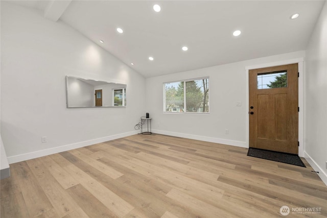 foyer entrance with recessed lighting, light wood-style flooring, baseboards, and lofted ceiling