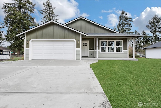 ranch-style house featuring driveway, a front lawn, fence, a shingled roof, and a garage