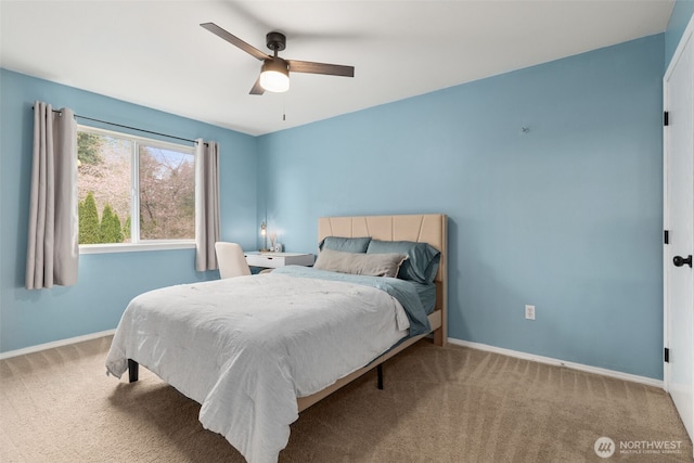 bedroom with baseboards and carpet flooring