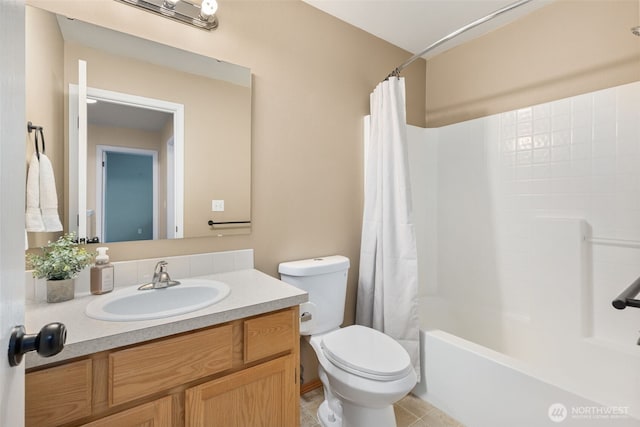 bathroom featuring vanity, shower / tub combo with curtain, toilet, and tile patterned flooring