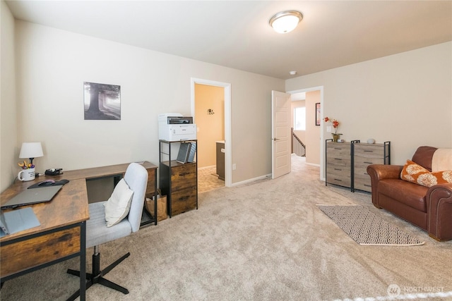 office space featuring carpet flooring and baseboards