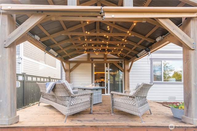 wooden deck featuring visible vents