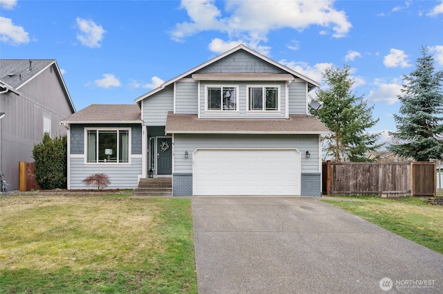 view of front of house with driveway, fence, a front yard, a garage, and brick siding