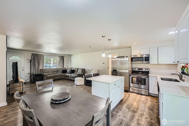 dining area featuring light wood-style flooring