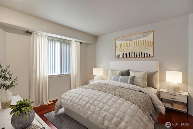 bedroom featuring wood finished floors