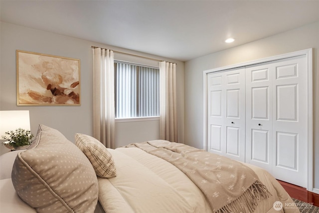 bedroom with a closet and recessed lighting