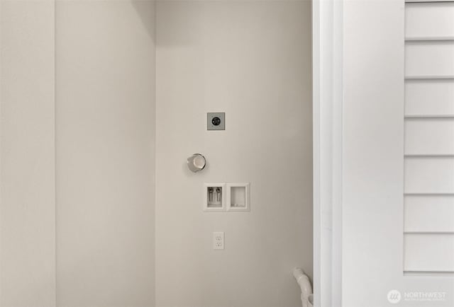 clothes washing area featuring laundry area, electric dryer hookup, and washer hookup