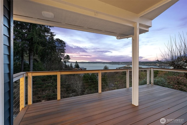 deck at dusk with a water view