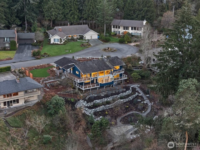 aerial view with a wooded view