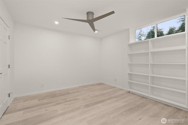 empty room featuring recessed lighting, baseboards, ceiling fan, and wood finished floors