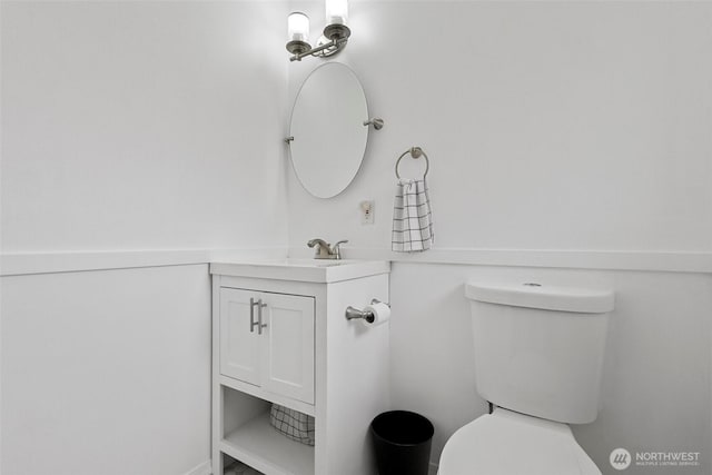 half bath with toilet and vanity