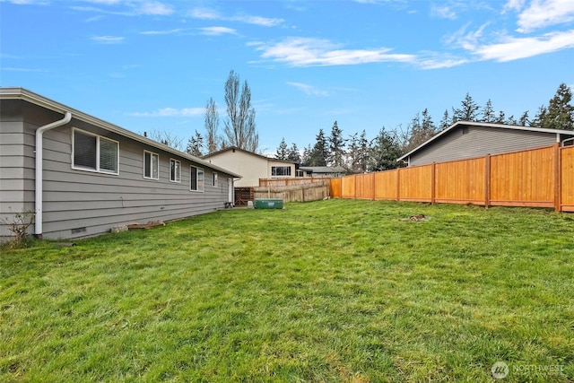 view of yard with fence