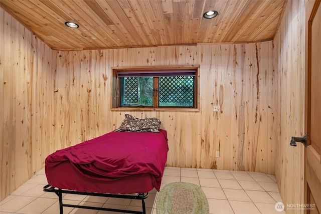 bedroom featuring recessed lighting, wooden ceiling, tile patterned floors, and wood walls