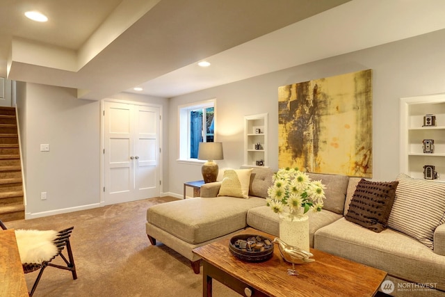 carpeted living area with recessed lighting, stairway, baseboards, and built in shelves