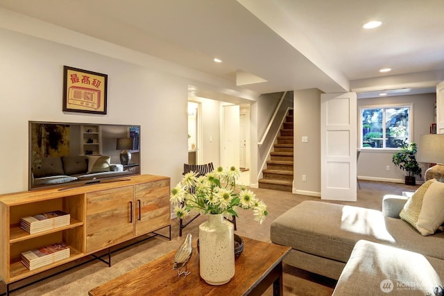 living room with recessed lighting, stairway, baseboards, and carpet