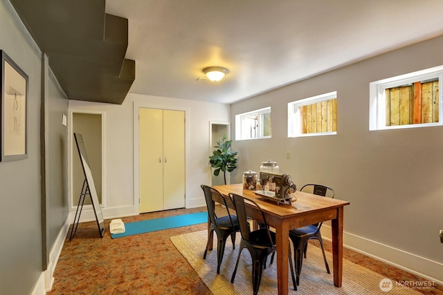 dining room featuring baseboards