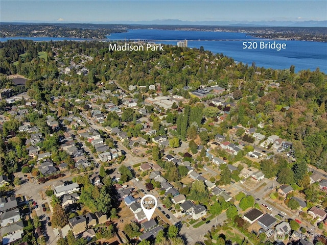 bird's eye view featuring a residential view and a water view