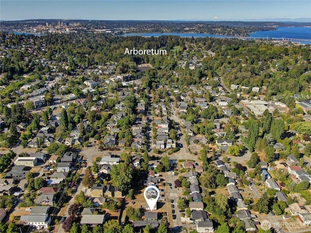 aerial view featuring a residential view and a water view