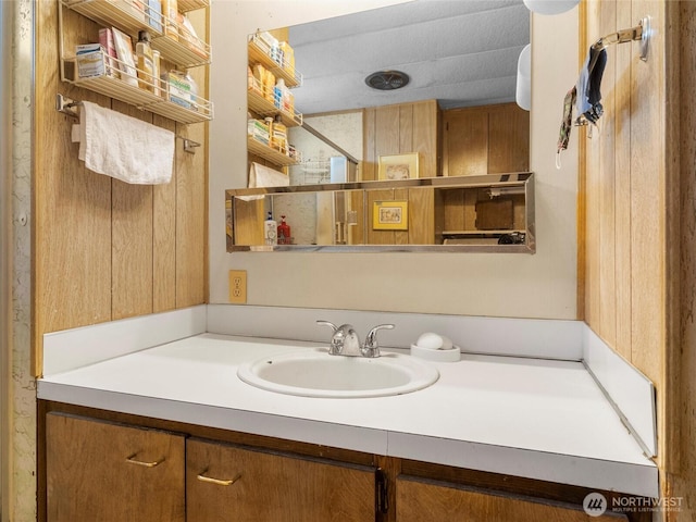 bathroom with vanity and walk in shower