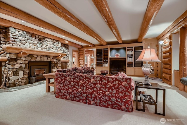 living room featuring rustic walls, carpet flooring, beam ceiling, and a fireplace