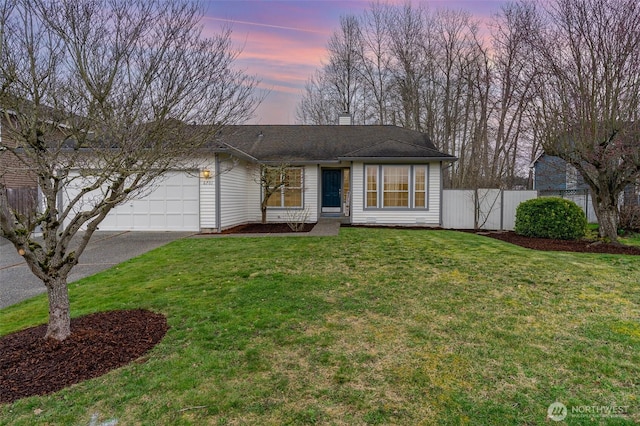 single story home with a yard, driveway, a garage, and fence