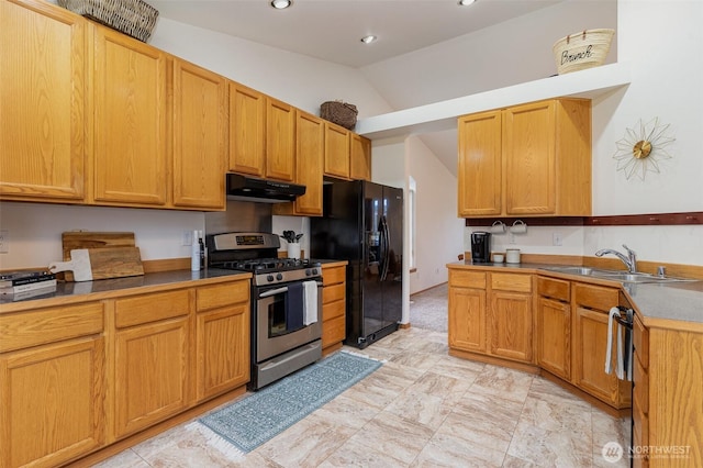 kitchen with black appliances, under cabinet range hood, a sink, recessed lighting, and lofted ceiling