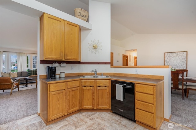 kitchen featuring a sink, black dishwasher, a peninsula, light colored carpet, and vaulted ceiling