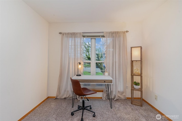 office featuring baseboards and carpet floors