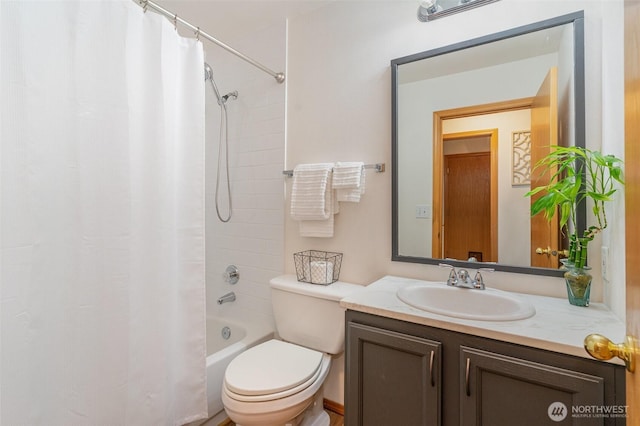 full bathroom with vanity, toilet, and shower / tub combo with curtain