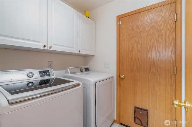 laundry area with cabinet space and washing machine and dryer