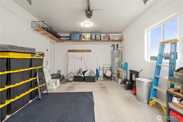 garage with electric water heater and a garage door opener